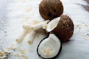 Coconuts and coconut sweets. Selective focus and small depth of field.
