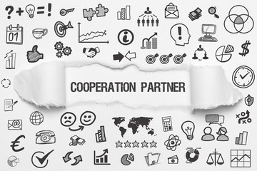 Cooperation Partner / weißes Papier mit Symbole