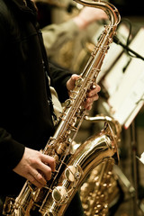  Saxophone musician in his hands closeup