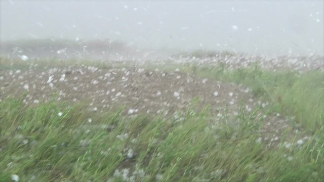 Massive Hail Strikes Thunder on Ground and Car