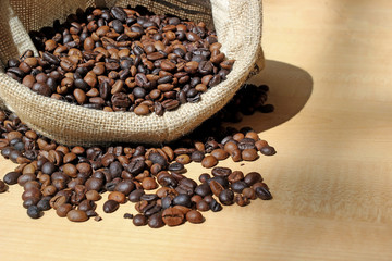 roasted coffee beans in sack bag