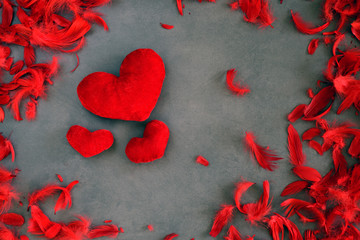 Valentine's Day - red hearts on a gray background © dominikab