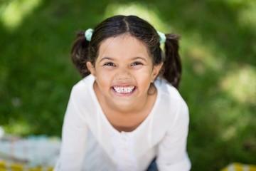 Portrait of girl smiling in park