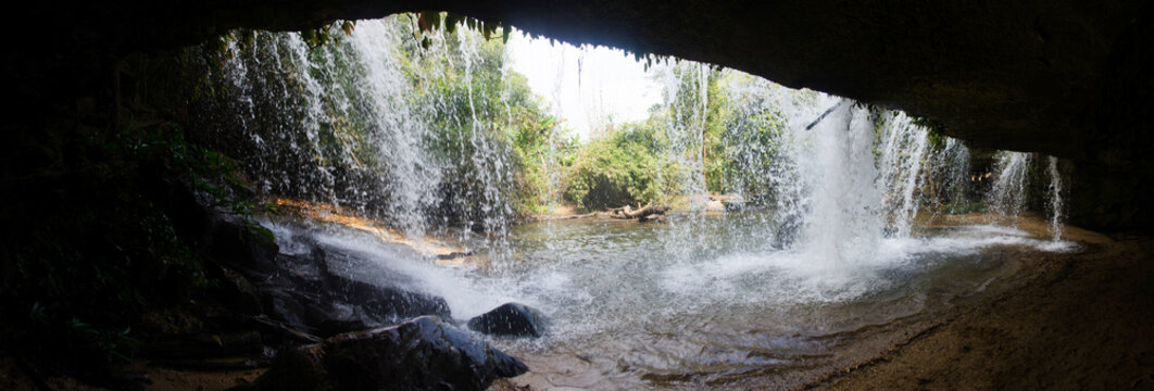 Behind the waterfall