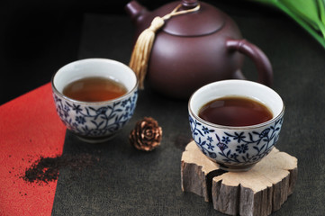 Chinese Tea Cup on piece of Wooden