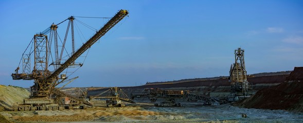 Open development. Huge machines manganese ore is mined in open pits. Metallurgical industry in...