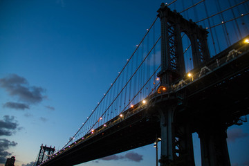 Light on the Manhattan bridge at night, New York