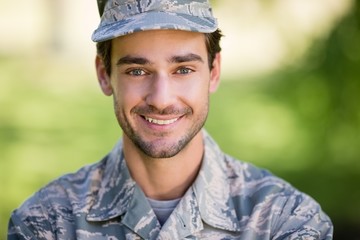 Portrait of soldier smiling in park