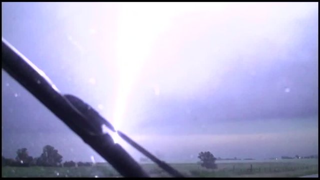 Lightning Strikes Close to Storm Chase Car