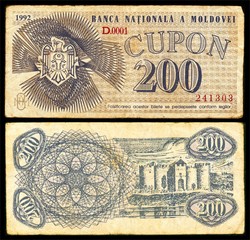 Old banknotes 200 Moldovan coupons 1992. Isolated on a black background. The front and back side.