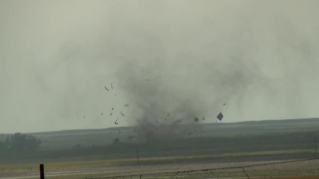 Tornado Causing Damage to Farm