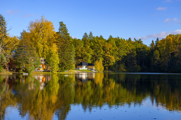 Fototapeta na wymiar Autumn forest reflection in pond, Aegviidu, Estonia