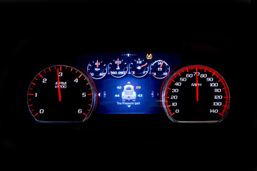 Modern light car mileage on black background TSI
