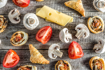 Flat lay cooking concept with puff pastry and ingredients for filling