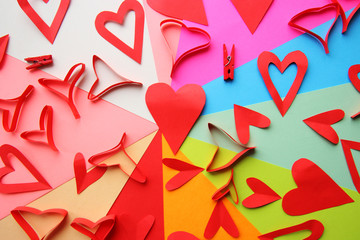 Red hearts on the variegated background - obrazy, fototapety, plakaty