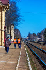 On the platform of the railway station, a small provincial town.