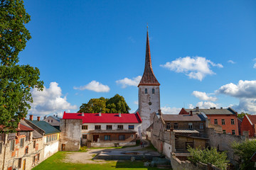 Fototapeta na wymiar St. Trinity Church and old town of Rakvere, Estonia. Green summer time