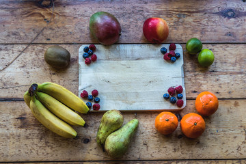Healthy fruits on chopping board