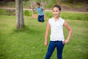 Portrait of girl standing in park