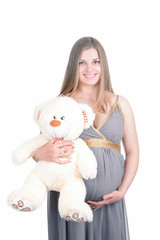 Pregnant with a soft toy