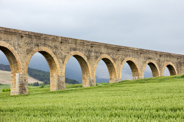 Fototapeta na wymiar Roman Aqueduct At Pamplona city in Navvra, Spain