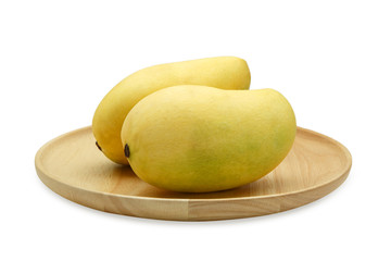 Mango in wooden plate.