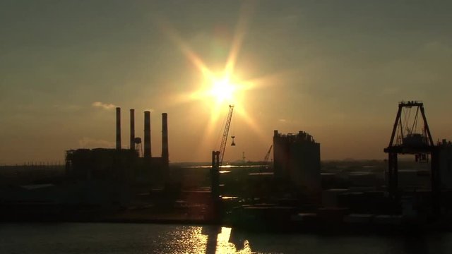 Sunset over a power plant