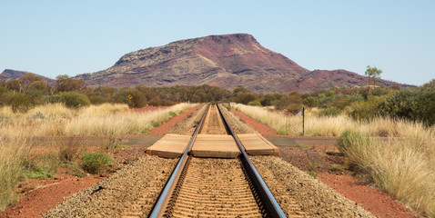 Straight railroad track in the Australian desert