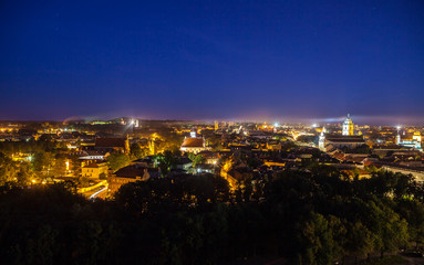 Vilnius city night aerial view - Lithuanian capital by bird eye