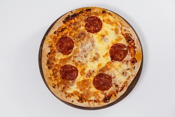 Delicious italian pizza served on pizza tray