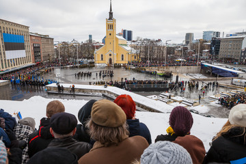 Celebrating of Day of Independence and the Defence Forces parade on Freedom Square in Tallinn, Estonia. Estonian people meet the holiday