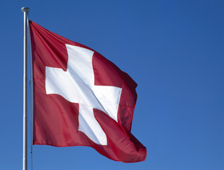 Naklejka premium Schweizer Flagge weht im Wind