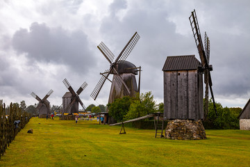 Fototapeta na wymiar Angla, Saaremaa, Estonia. Old wooden windmills at farm on Estonian island Saaremaa