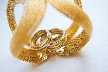 gold jewelry close up. wedding rings. a gift for St. Valentine's Day.
