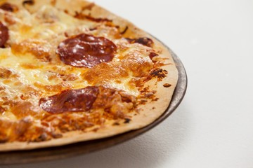 Delicious italian pizza served on pizza tray