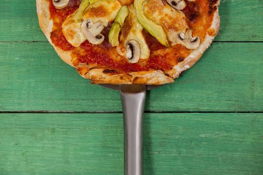 Delicious Italian Pizza Served On Pizza Peel