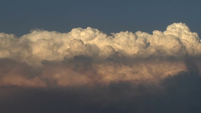 Boiling Cumulus Clouds at Sundown