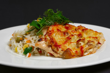Baked meat with mushrooms and cheese with