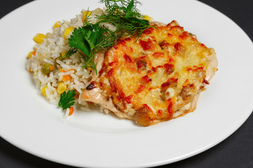 Baked meat with mushrooms and cheese with