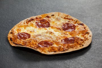 Delicious italian pizza served on grey background