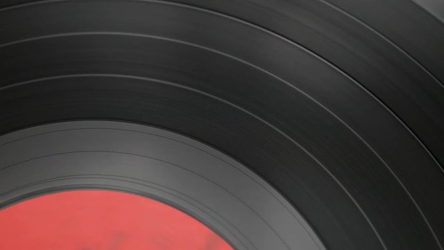 Closeup rotating vinyl record disc