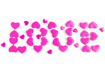 The word love written in pink hearts isolated on white background