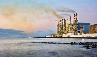 Sunrise at Arrecife in Lanzarote with the water desalination plant in background.  