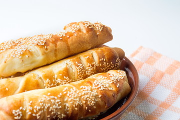 Sesame covered pastry in a bowl