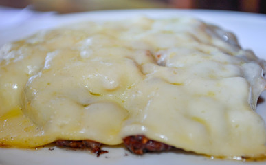 Meat Steak Covered with Mozzarella Cheese