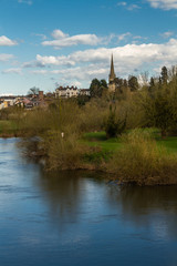 Fototapeta na wymiar Ross on Wye, river in foreground. Late afternoon.