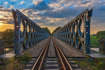 Fototapeta na wymiar HDR Brücke / Eisenbahnbrücke über die Jeetzel, zwischen Hitzacker und Dannenberg (Wendland, Niedersachsen).