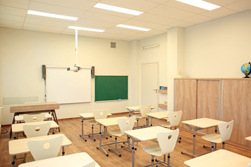 Empty classroom with chairs and desks