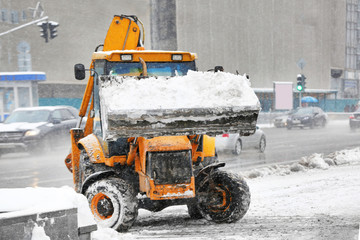Snow plow outdoors cleaning street