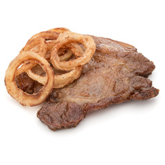 Cooked fried pork meat with onion slices garnish isolated on whi